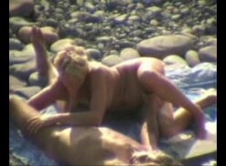 Sexo en la playa voyeur